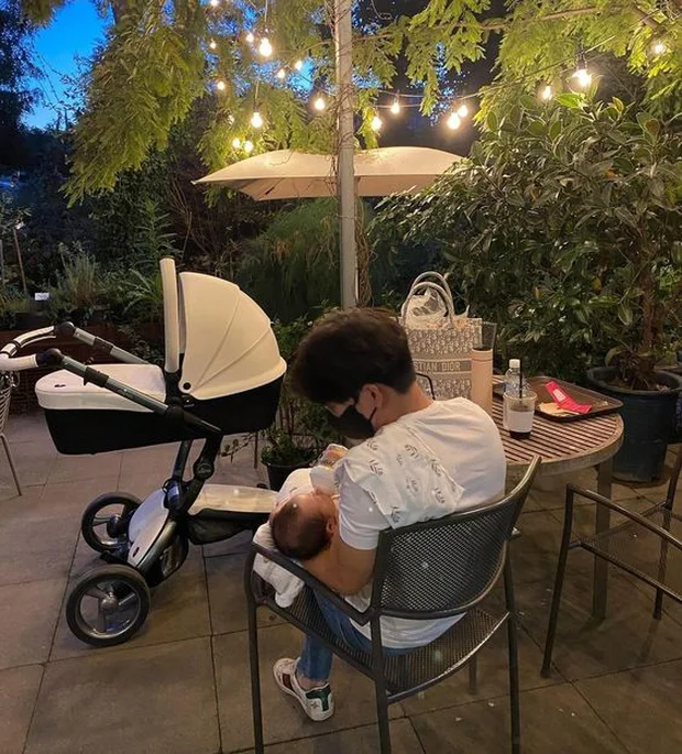 Photo Speculated to Be Hyun Bin Holding His Son Surfaces After Divorce Rumors